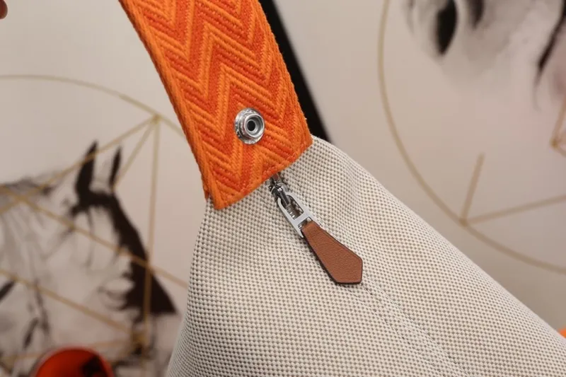 Hermes Beige Canvas Cosmetic Bag with Orange Handle - Image 7