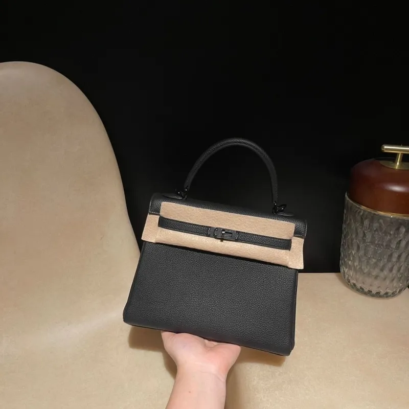 Hermes Black Leather Kelly Handbag 54