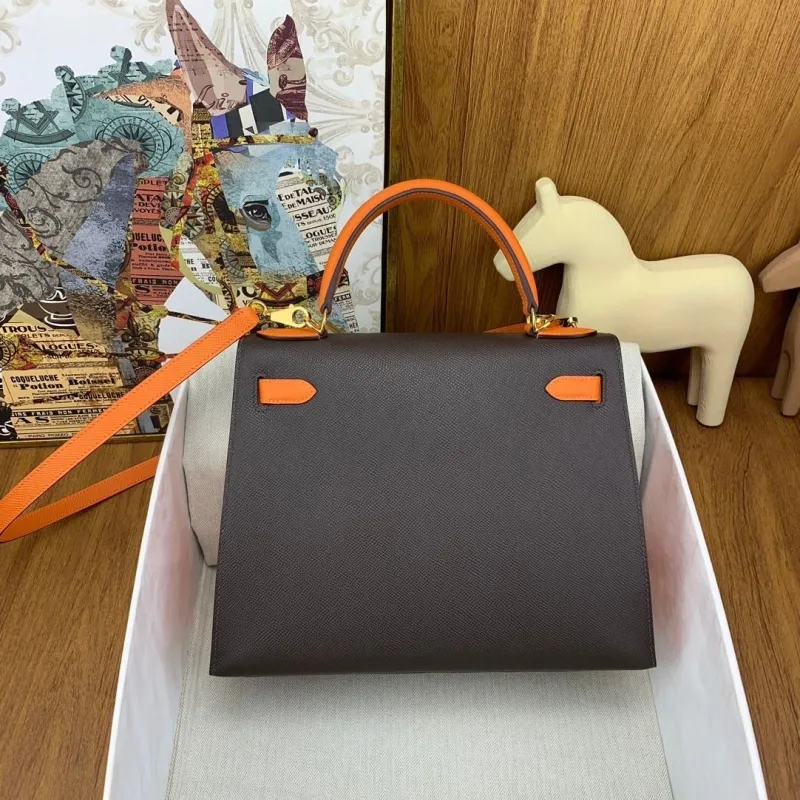 Hermes Dark Brown Orange Leather Kelly Handbag
