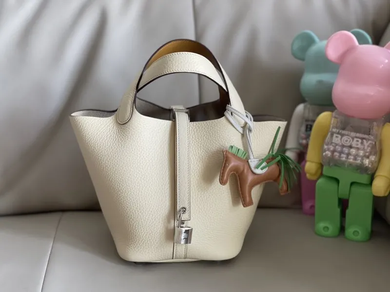 Hermes Cream Leather Bucket Handbag with Horse Charm