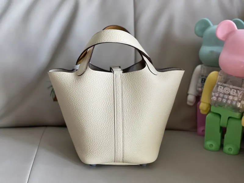 Hermes Cream Leather Bucket Handbag with Horse Charm - Image 4