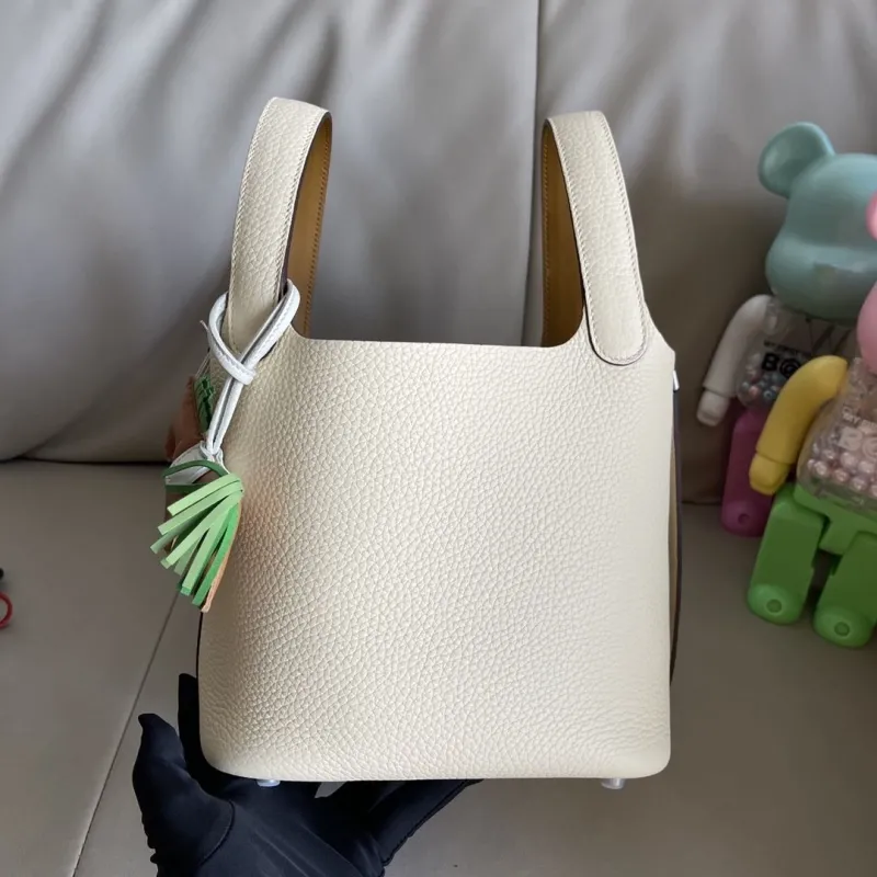 Hermes Cream Leather Bucket Handbag with Horse Charm - Image 6