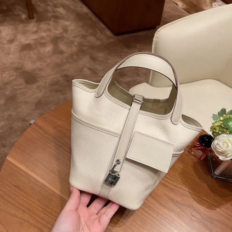 Hermes Off-White Canvas Bucket Tote Bag