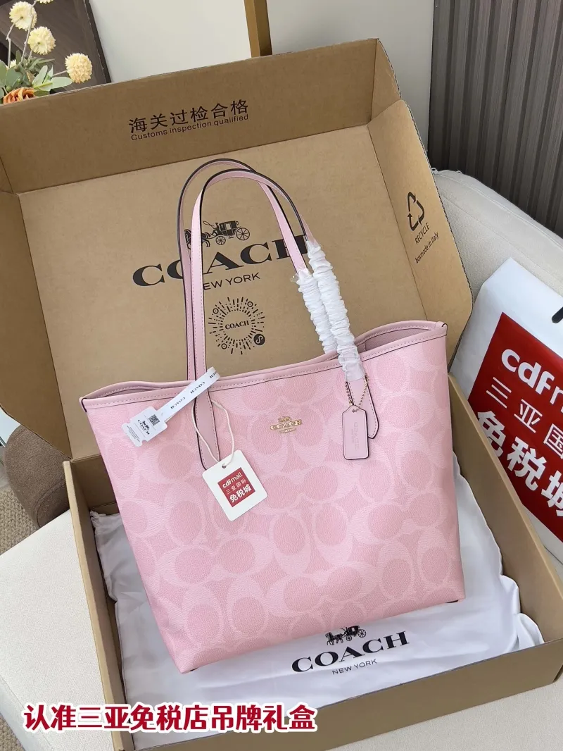 Coach Pink Signature Tote Bag
